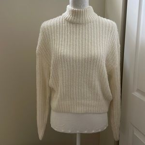 Divided soft acrylic crop sweater
